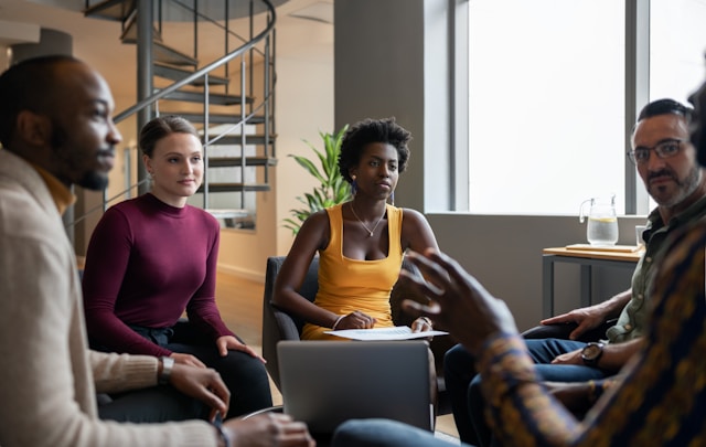 A photo of an employee meeting. 