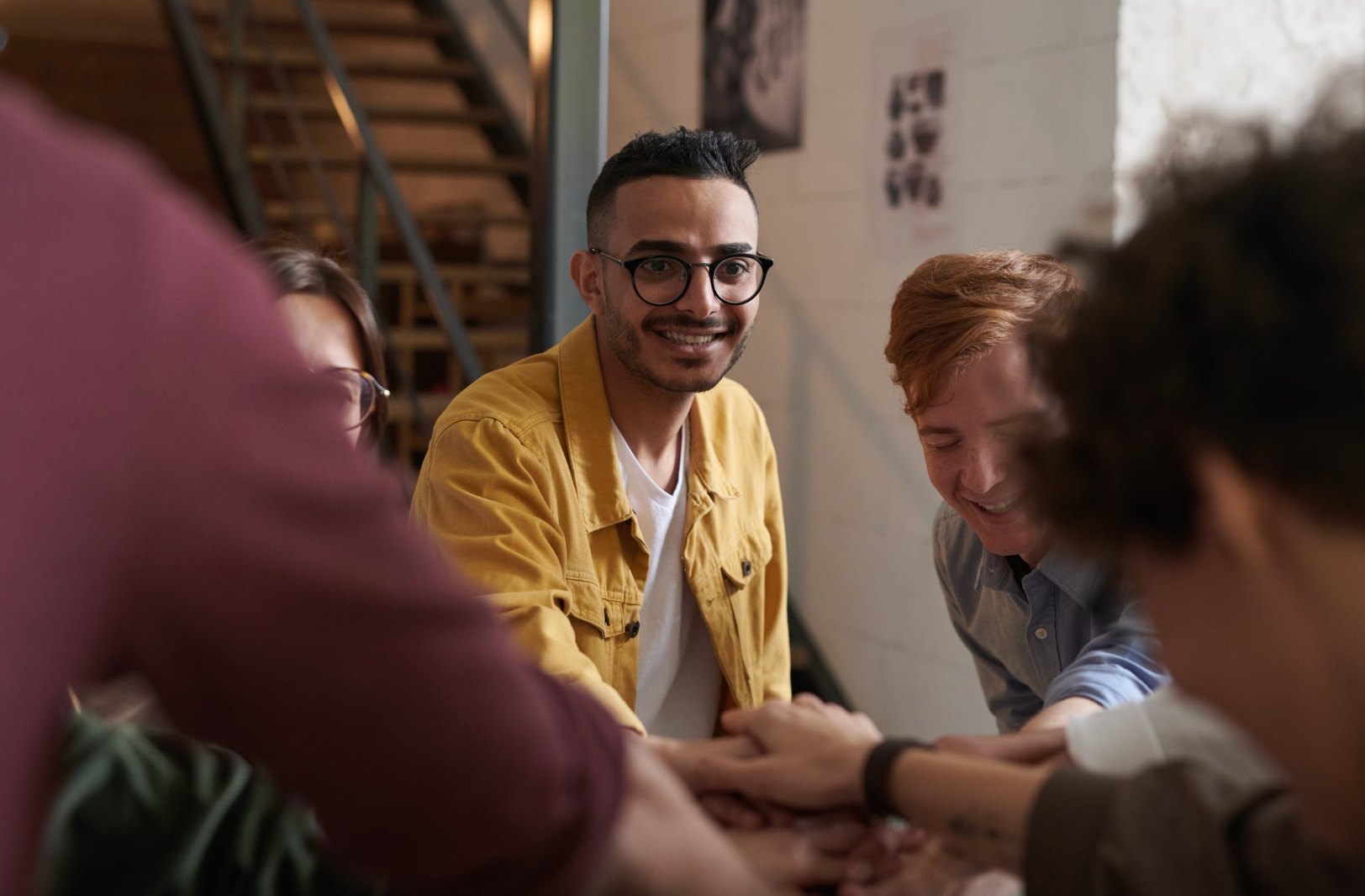 Photo of a happy, diverse team working together