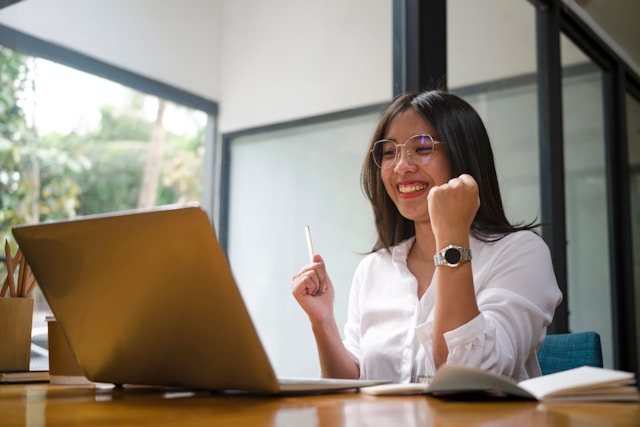 A photo of an employee celebrating an accomplishment.