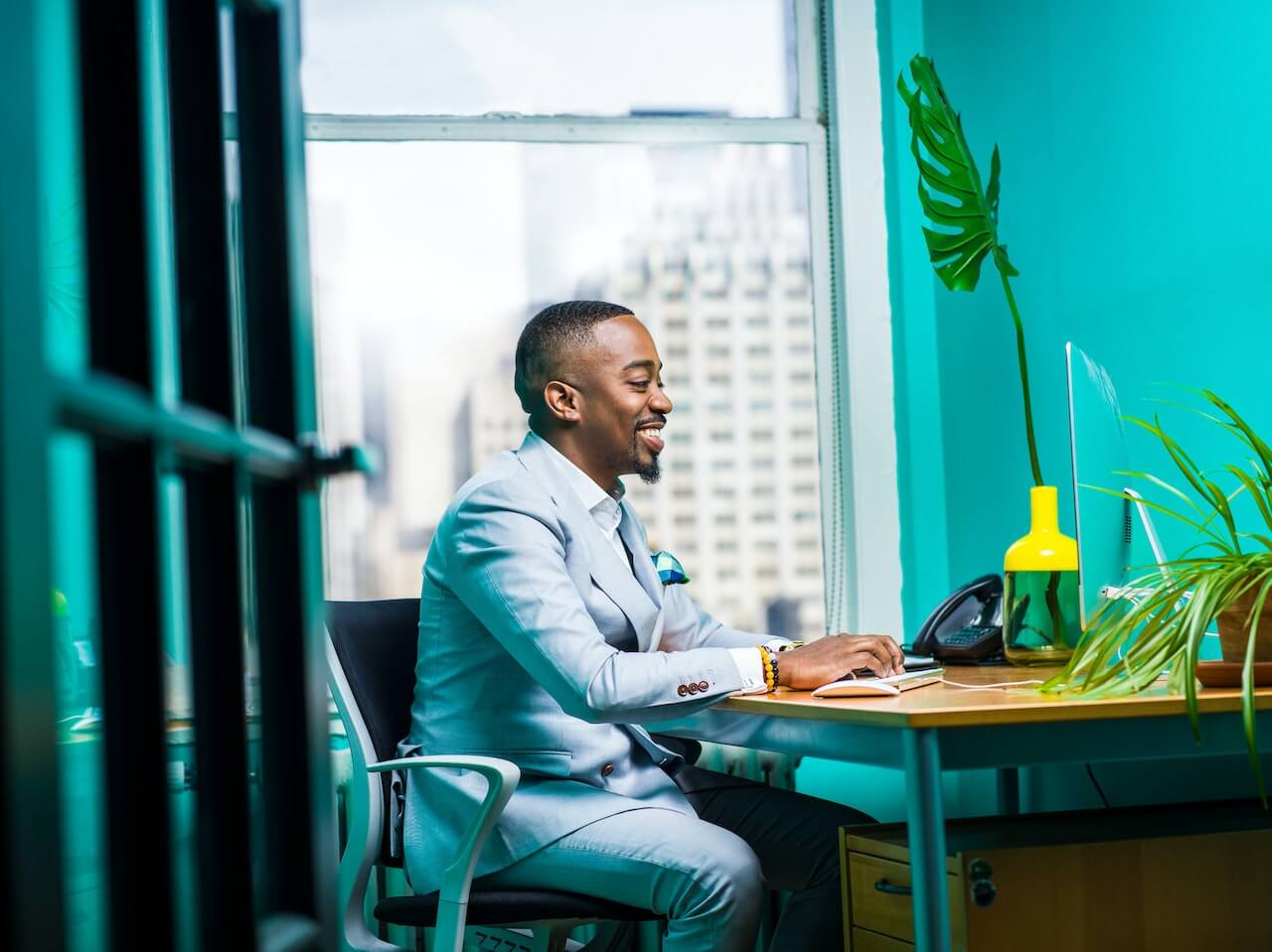 Photo of an employee working in their office.