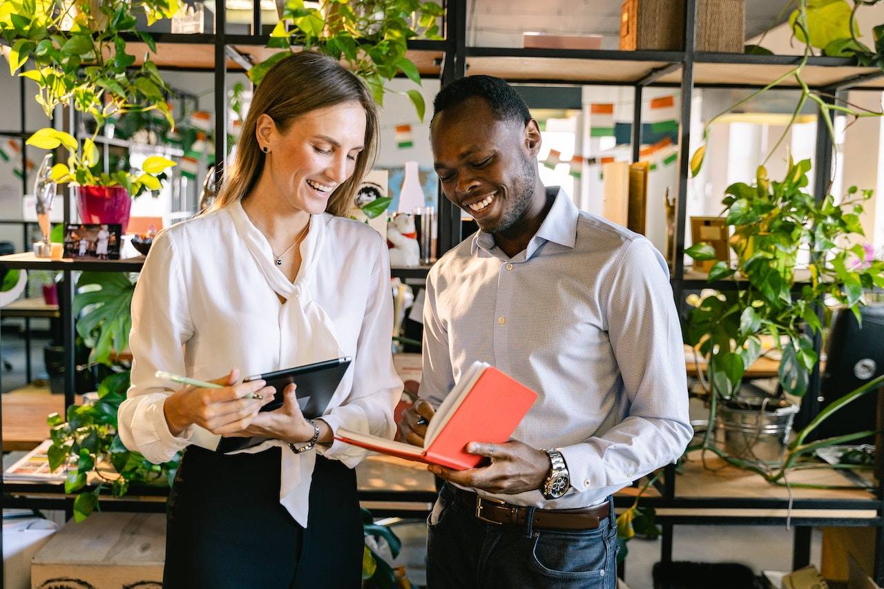 Photo of a manager talking with an employee one-on-one.